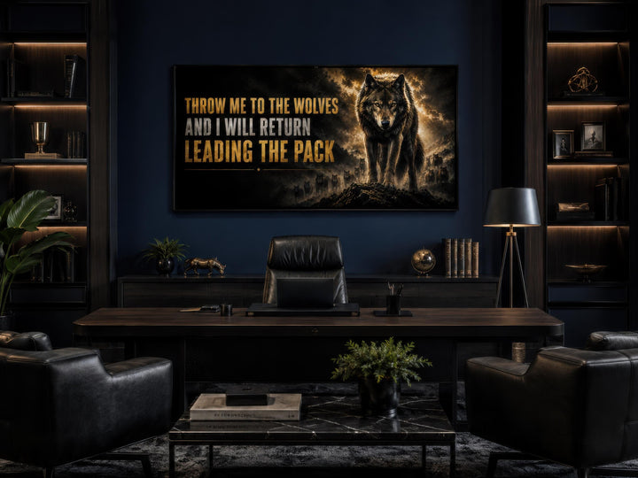Throw Me To The Wolves motivational canvas art in a dark, modern office with leather furniture.