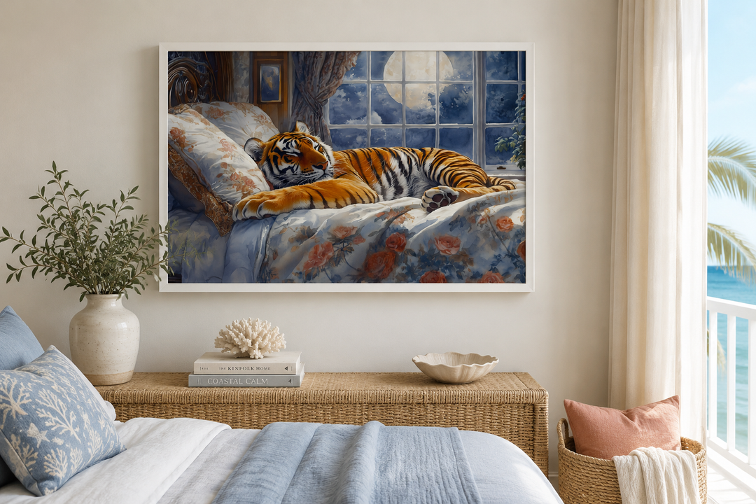 Framed canvas wall art of a tiger sleeping in a bed by a moonlit window above a bedroom console.