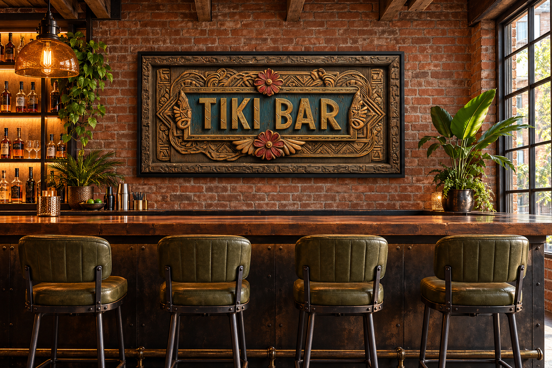 Tiki Bar Framed Sign Canvas Wall Art on a brick wall above a bar with green leather stools.