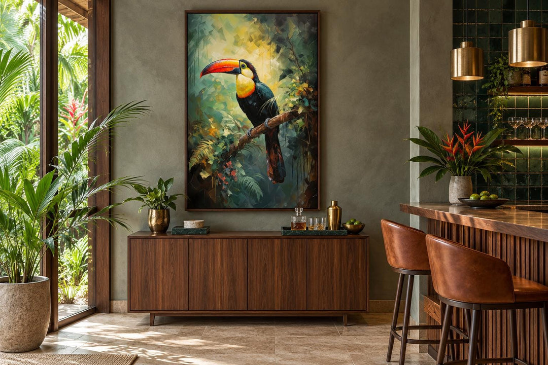 Toucan in the Rainforest tropical framed canvas wall art hanging above a wooden sideboard.