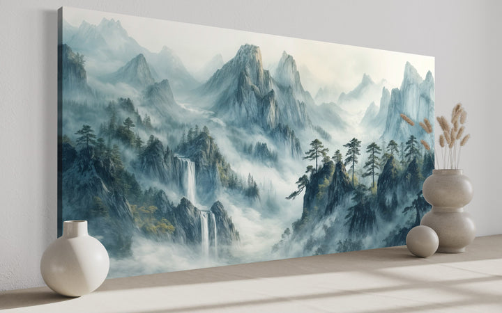 Traditional Chinese Shan Shui Hua style framed canvas art featuring misty mountains and waterfalls.