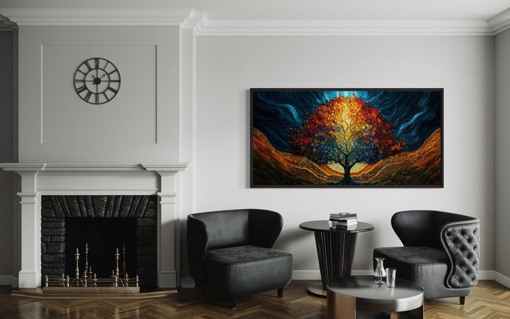 A colorful Tree of Life canvas print with a glowing canopy hangs in a modern living room.