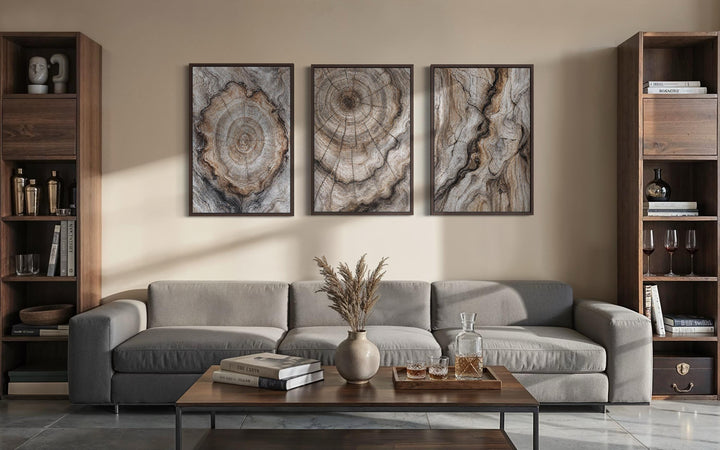 Tree Rings Wood Grain Set of 3 Canvas Wall Art displayed above a sofa in a modern living room.