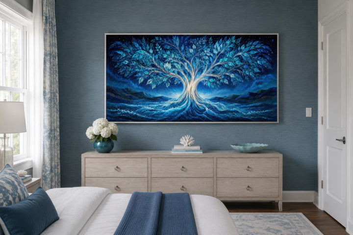 Tree of Life canvas wall art featuring a glowing blue and teal tree against a starry night sky.
