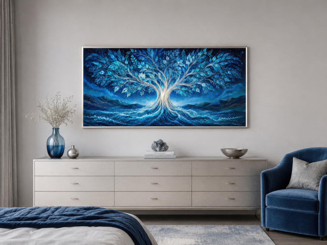 Mystical Tree of Life canvas art in electric blue and teal above a modern dresser in a bedroom.