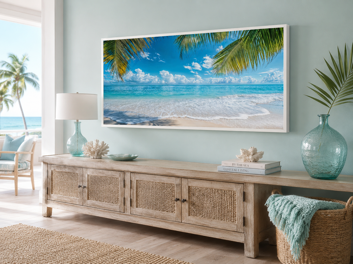 Tropical Beach With Palm Trees Framed Canvas Wall Art above a wooden console in a coastal room.