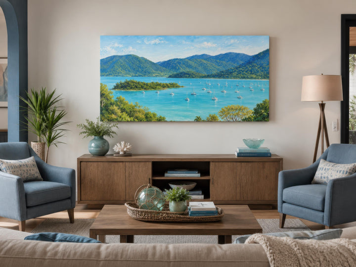 Tropical coastal canvas art featuring a turquoise bay with sailboats and lush green islands.