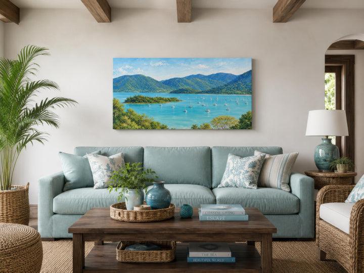 Tropical coastal canvas print featuring a turquoise bay with sailboats and lush green islands.