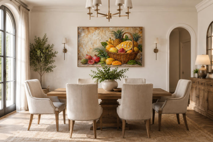 Tropical fruit basket canvas wall art featuring pineapple, mango, and pomegranate in a dining room.