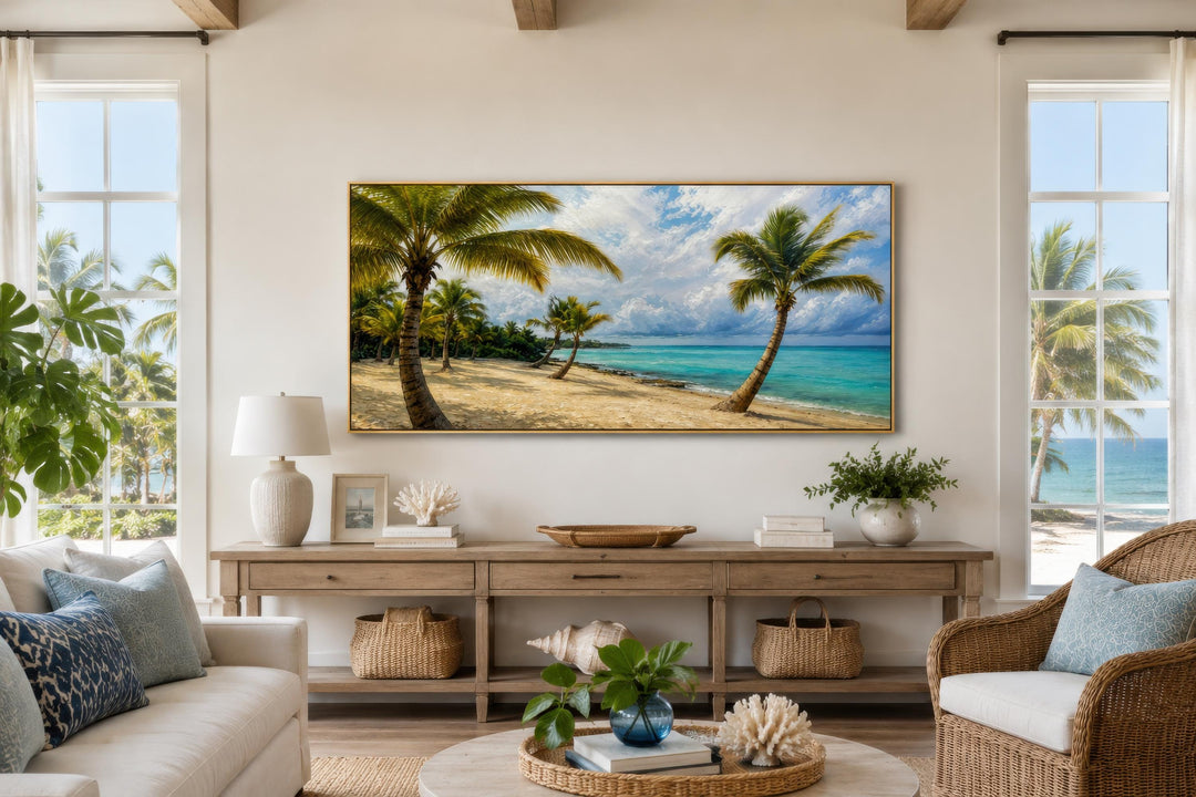 Tropical palm tree wall art canvas print hanging above a wooden console table in a coastal room.