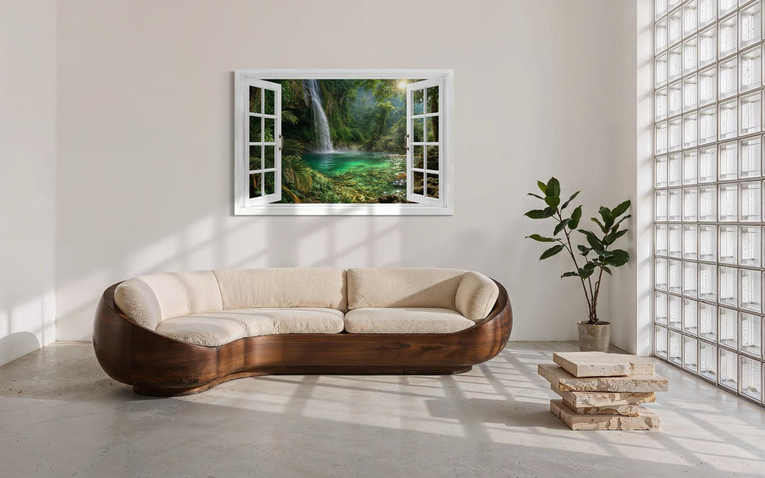 Tropical waterfall lagoon window view canvas wall art displayed in a modern living room.