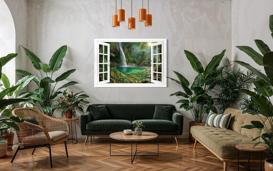A canvas wall art piece depicting a tropical waterfall lagoon through an open white window frame.
