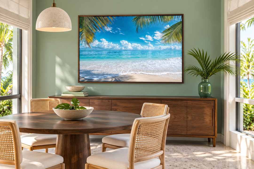 Tropical Beach With Palm Tree Framed Canvas Wall Art above a wooden sideboard in a dining room.