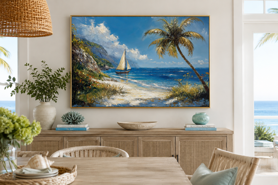 Tropical beach framed canvas wall art featuring a sailboat, palm tree, and vibrant blue ocean.