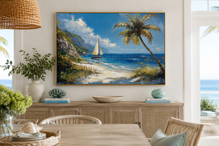 Tropical beach framed canvas wall art featuring a sailboat, palm tree, and vibrant blue ocean.