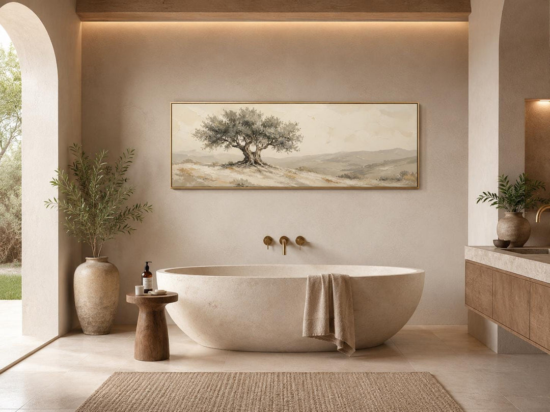 Long horizontal canvas print of a Tuscan olive tree in sage green and neutral tones above a bathtub.
