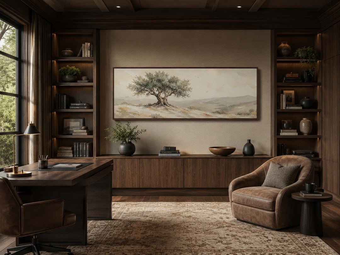 Tuscan olive tree canvas print in a sage green and neutral palette above a dark wood office console.