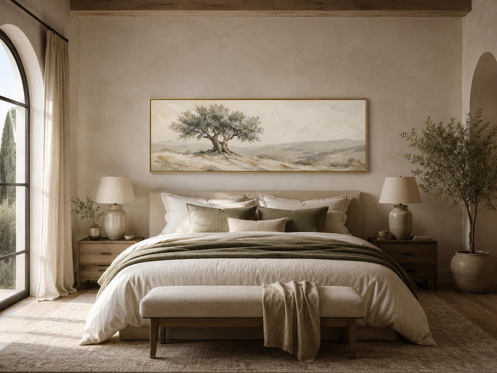 Long horizontal canvas print of a Tuscan olive tree in sage green and taupe above a neutral bed.