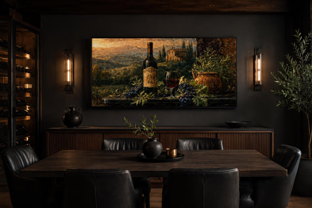 Tuscan wine bottle and landscape painting on canvas displayed in a dark, modern dining room.