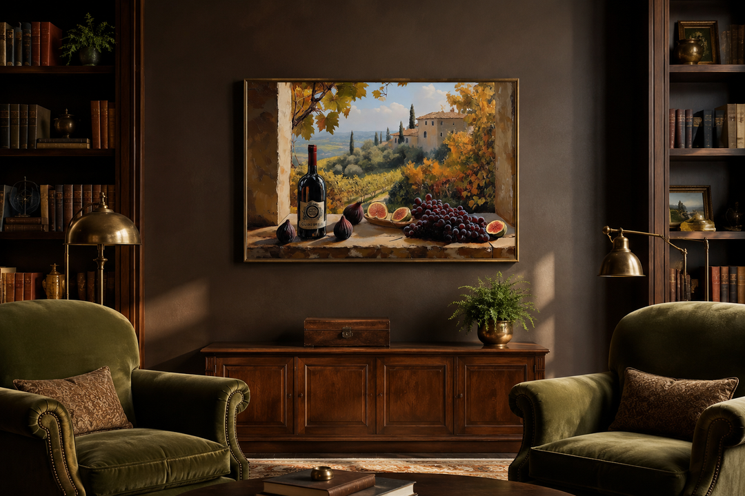 Tuscany vineyard window view wall art with wine bottle and grapes in a dark study with armchairs.