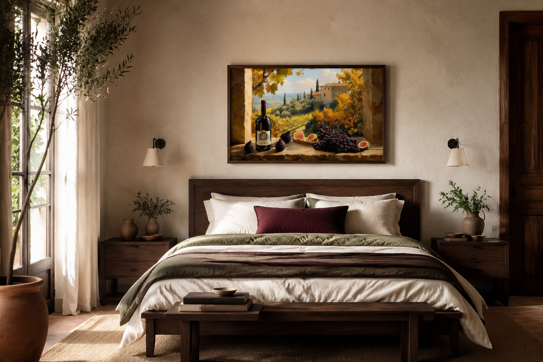 Tuscany vineyard window view wall art with wine bottle and grapes above a bed in a rustic bedroom.