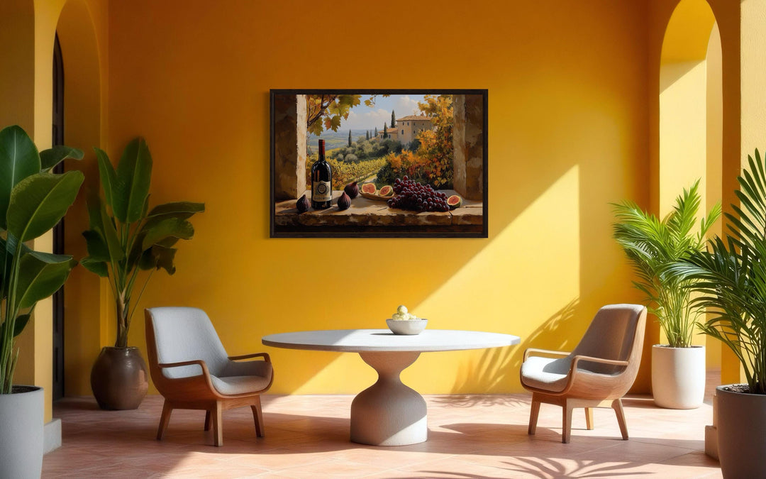 Tuscany vineyard window view wall art with wine and grapes in a yellow dining room setting.