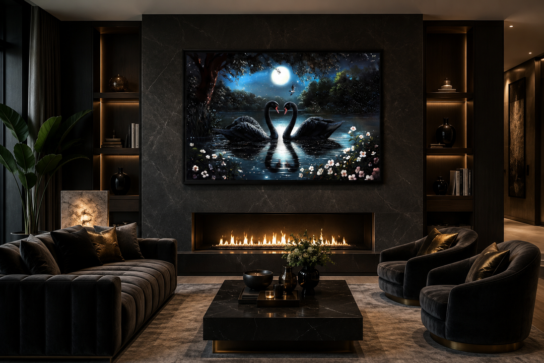 Framed canvas art of two black swans on a moonlit lake above a fireplace in a modern living room.