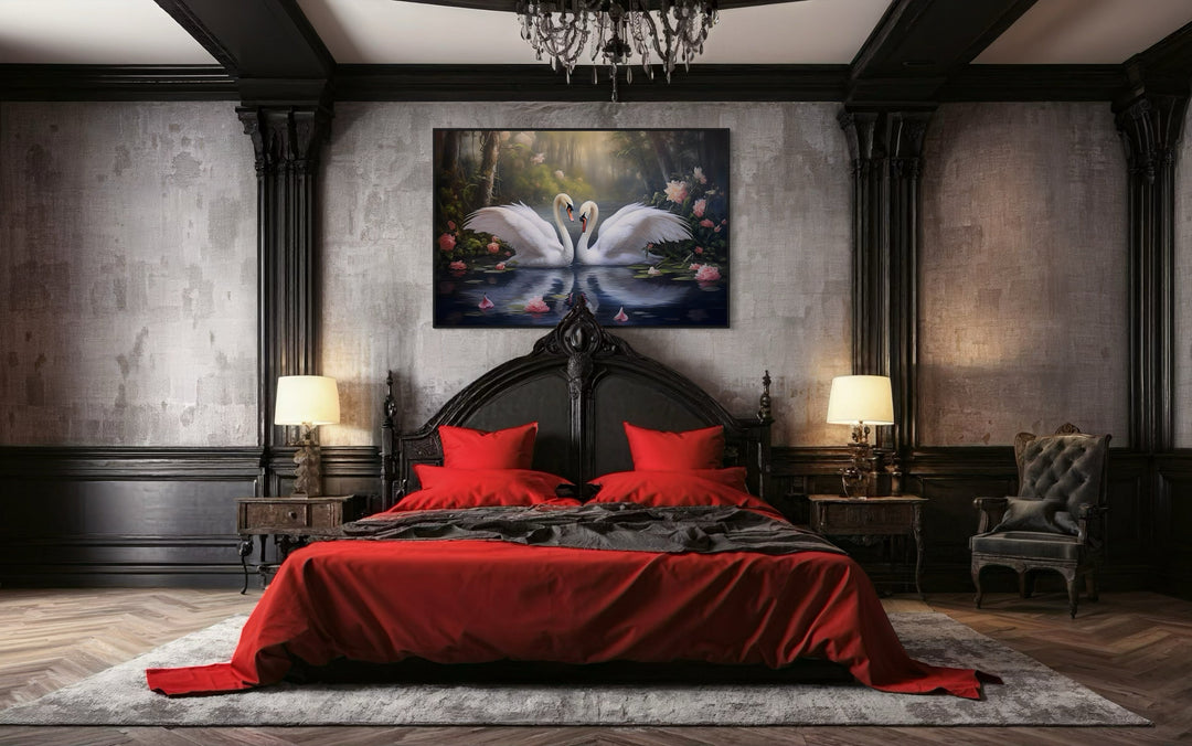 Two white swans in a lake romantic framed canvas wall art hanging above a bed in a dark bedroom.