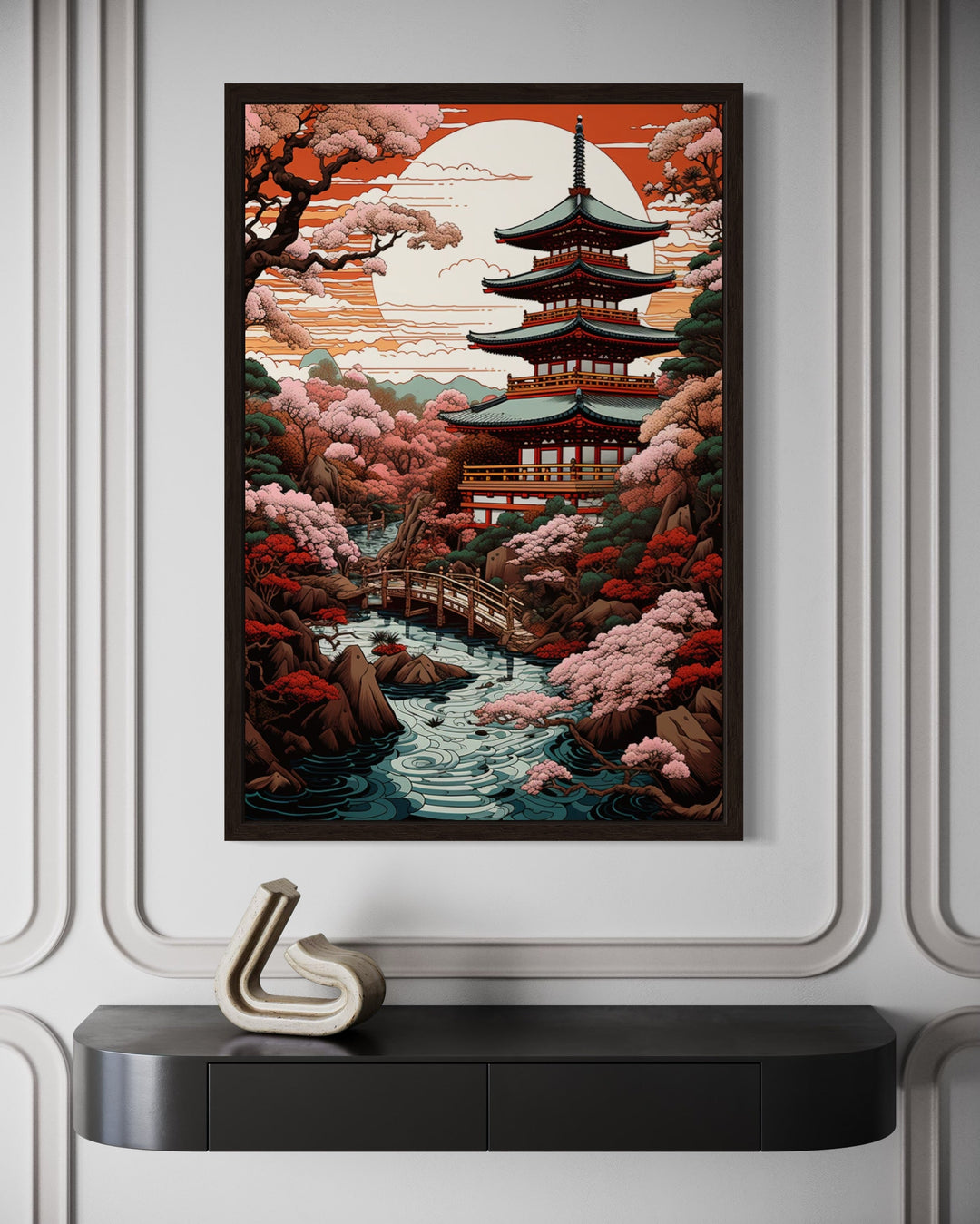 Ukiyo-e style framed canvas wall art of a Japanese pagoda, garden, and bridge over a stream.