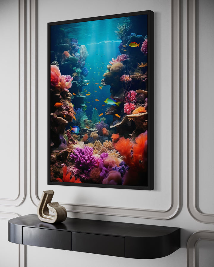 Framed canvas wall art of a vibrant underwater coral reef with colorful tropical fish.