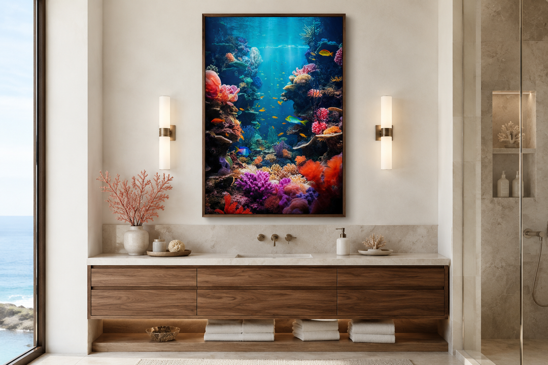 Framed underwater coral reef photograph canvas wall art hanging in a modern bathroom.