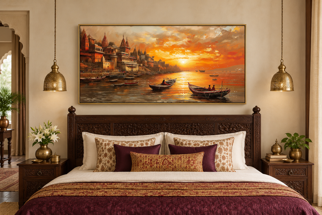 Varanasi sunset canvas art above a carved wooden bed with traditional Indian textiles and lamps.