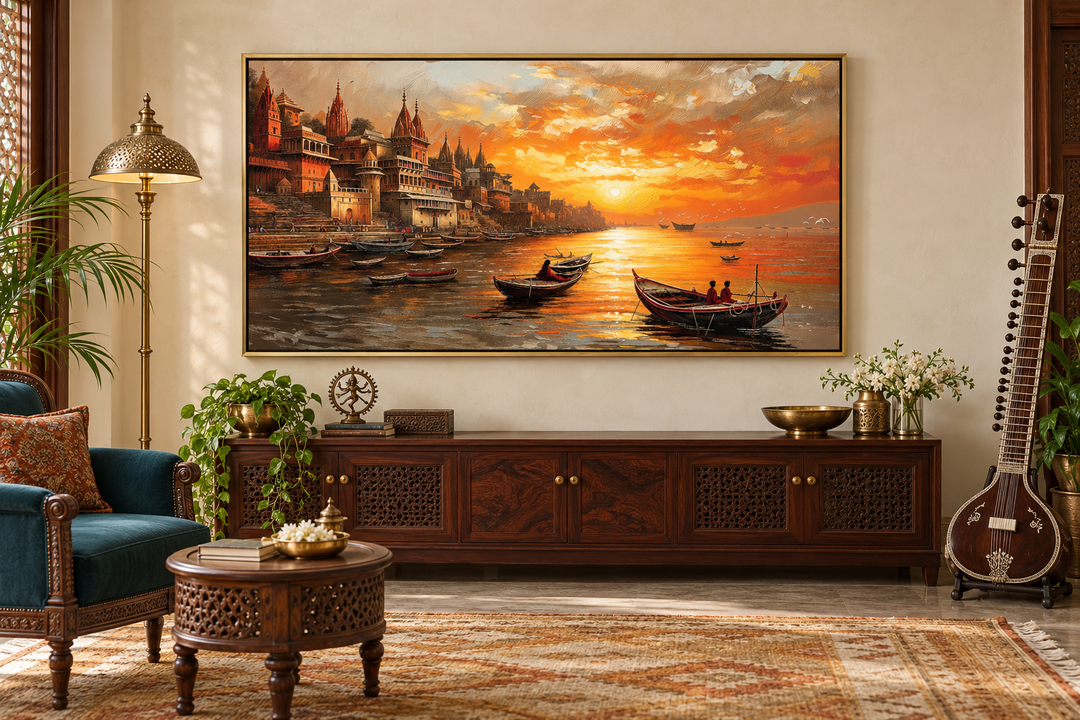 Varanasi wall art featuring a sunset over the Ganges River with boats and ghats in a gold frame.