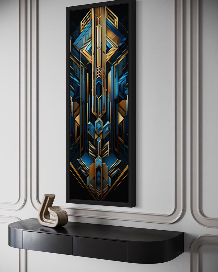 Vertical Art Deco framed canvas wall art with geometric patterns in gold, black, and blue.