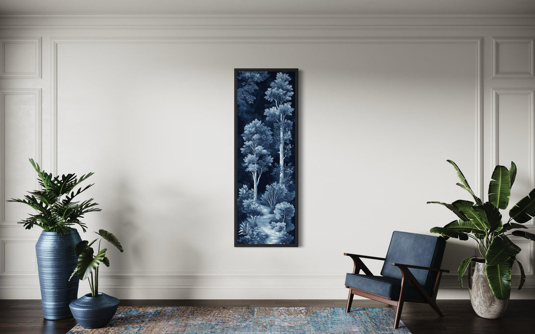 Vertical narrow wall art featuring a navy and blue night forest scene in a modern room.