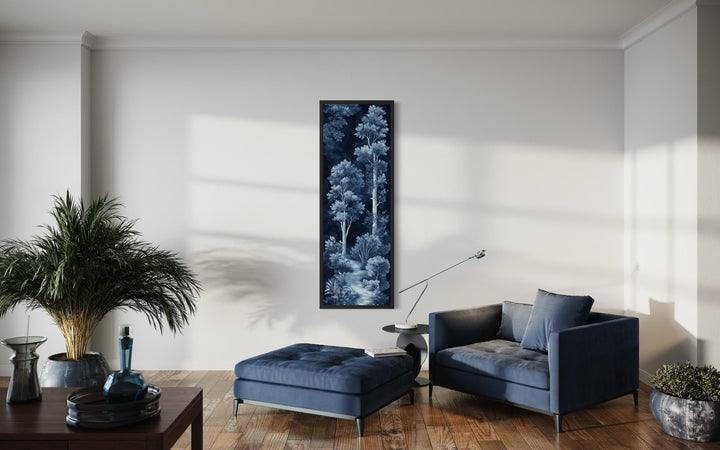 Vertical narrow wall art featuring a blue and navy night forest in a modern living room.