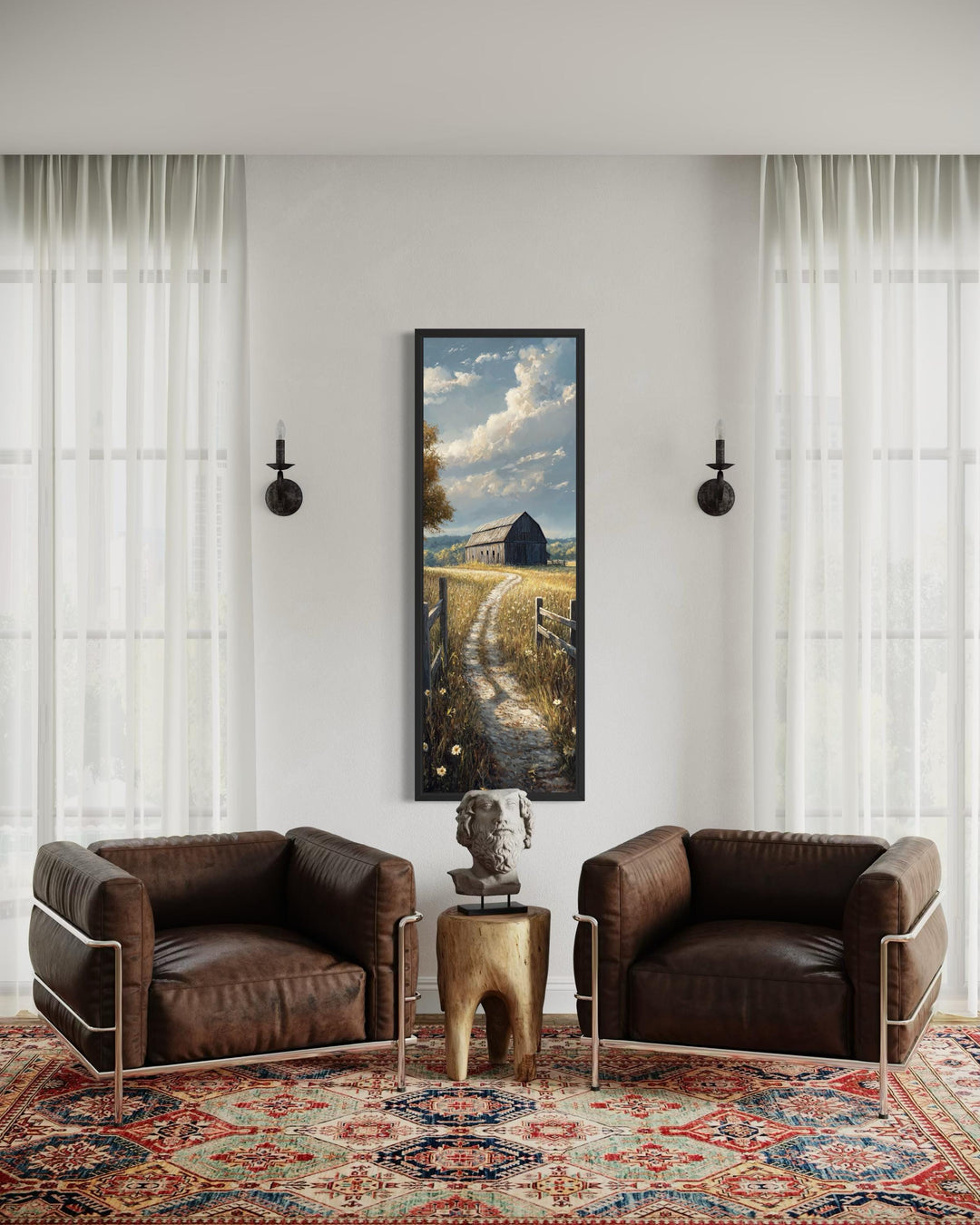 Vertical narrow canvas wall art of a rustic barn in a golden wheat field between two armchairs.