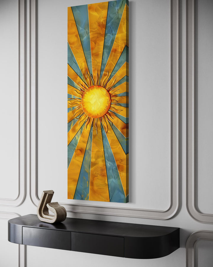 Vertical narrow framed canvas wall art featuring a yellow sun with rays against a blue sky.