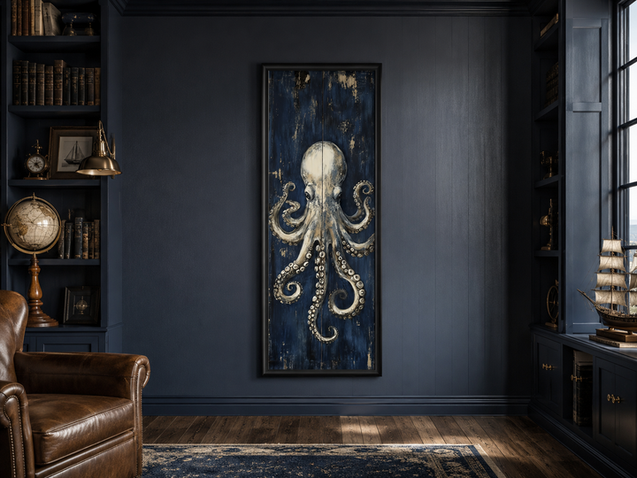 Vertical octopus wall art with metallic tentacles on a navy background in a dark blue library.