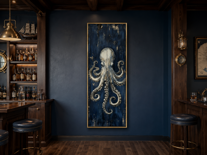 Vertical octopus canvas wall art with metallic tentacles on a navy blue background in a home bar.