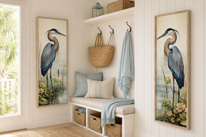 Set of two vertical canvas prints featuring Great Blue Herons in marsh reeds on a white paneled wall.