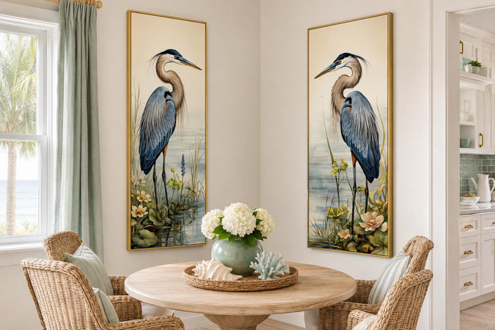 Vertical slim canvas wall art set of 2 featuring Great Blue Herons in a marsh with gold frames.