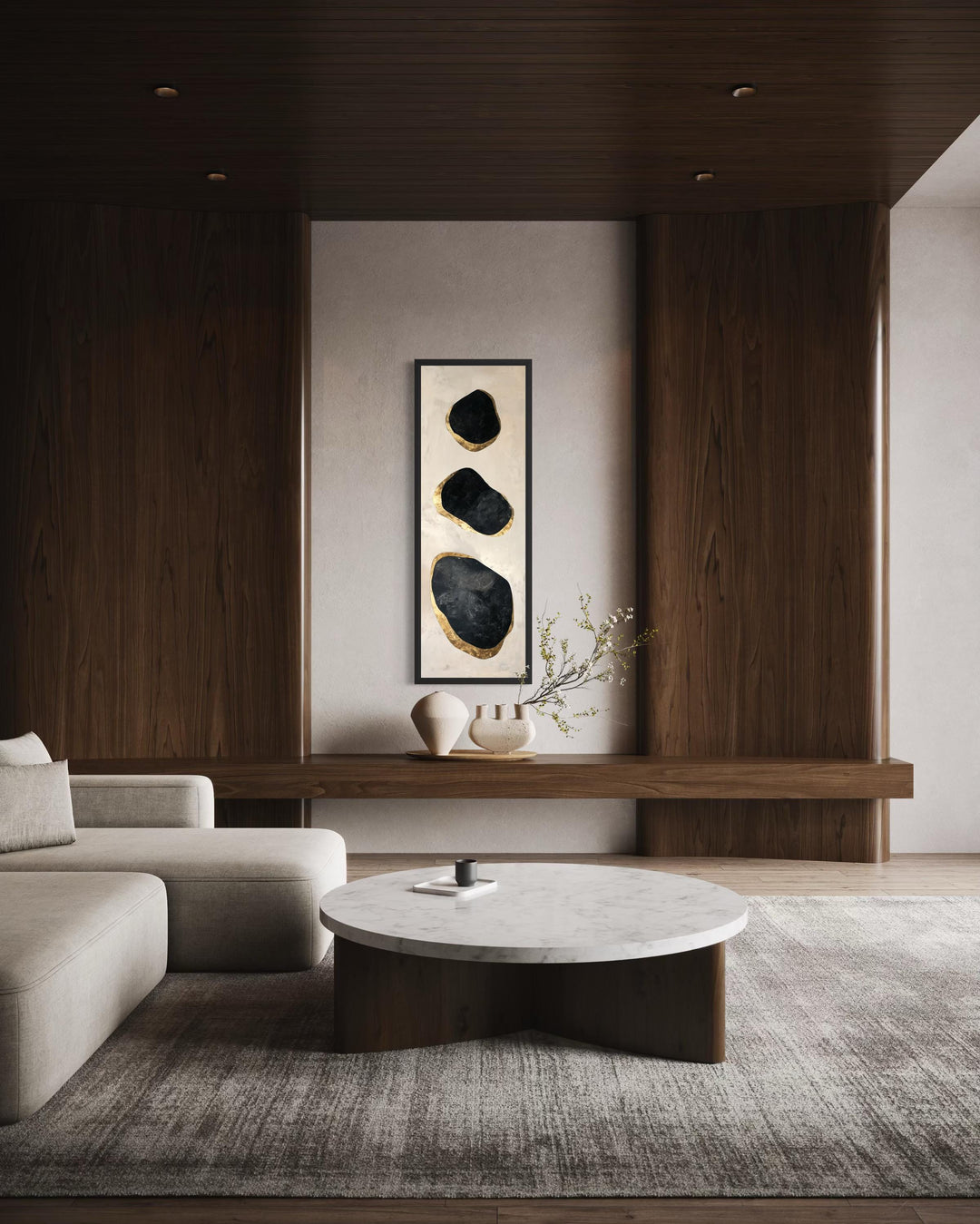 Vertical tall narrow wall art featuring black and gold abstract rock shapes in a modern room.