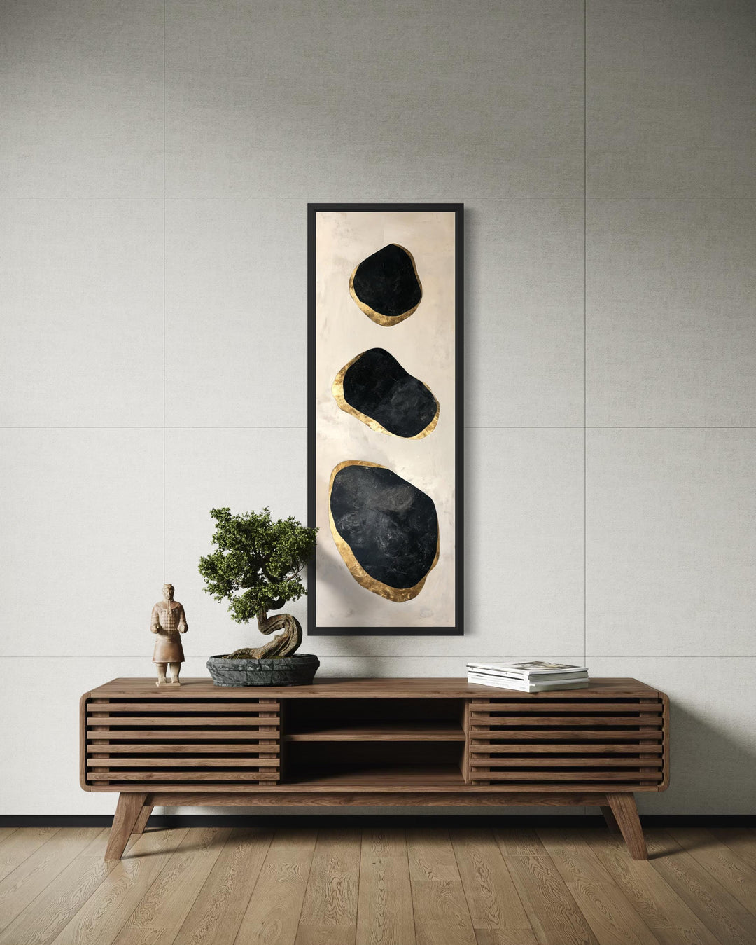 Vertical tall narrow wall art featuring three black and gold abstract rocks on a neutral background.