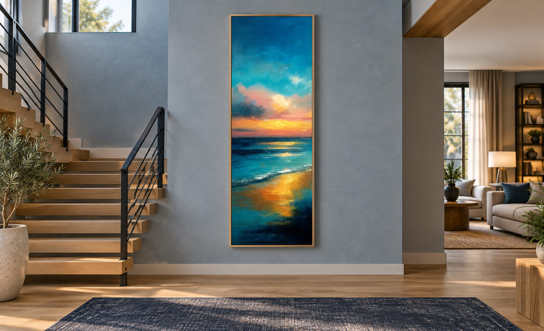 Vertical narrow abstract ocean sunset canvas wall art in a modern hallway with a staircase.