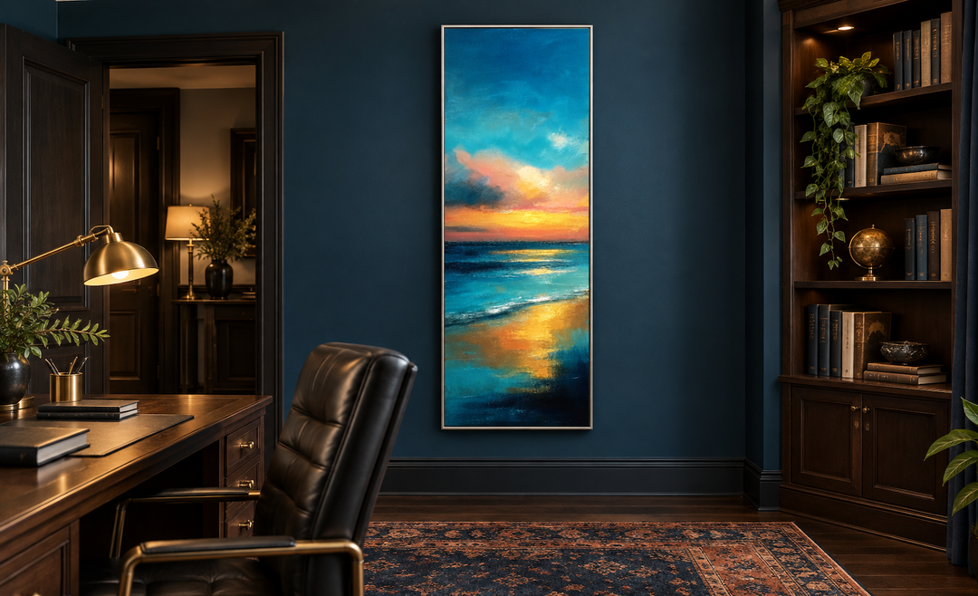 Vertical narrow abstract ocean sunset canvas wall art in a dark blue office with a wooden desk.