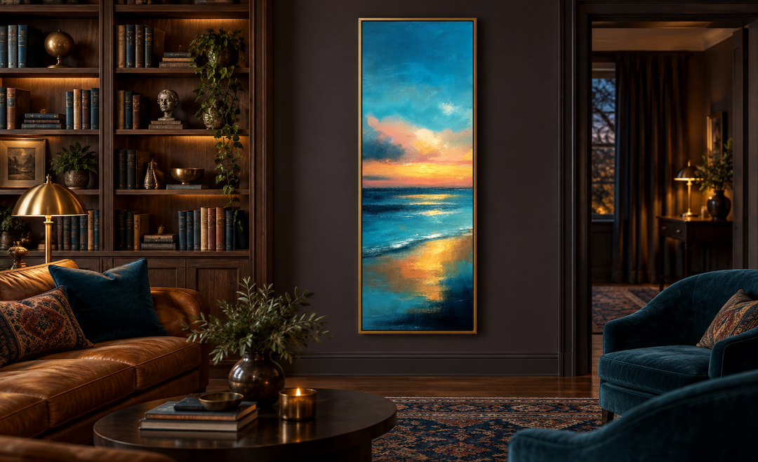 Vertical narrow abstract ocean sunset canvas wall art in a gold frame on a dark wall.