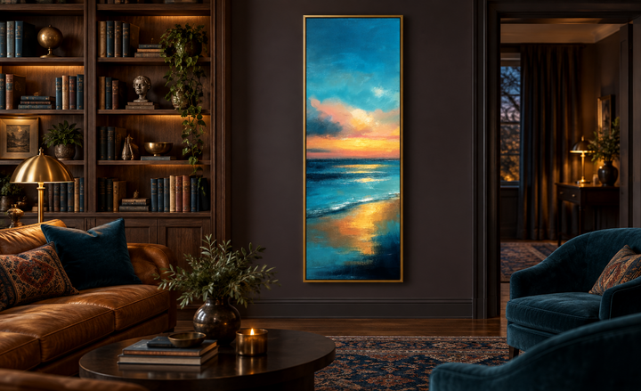 Vertical narrow abstract ocean sunset canvas wall art in a gold frame on a dark wall.