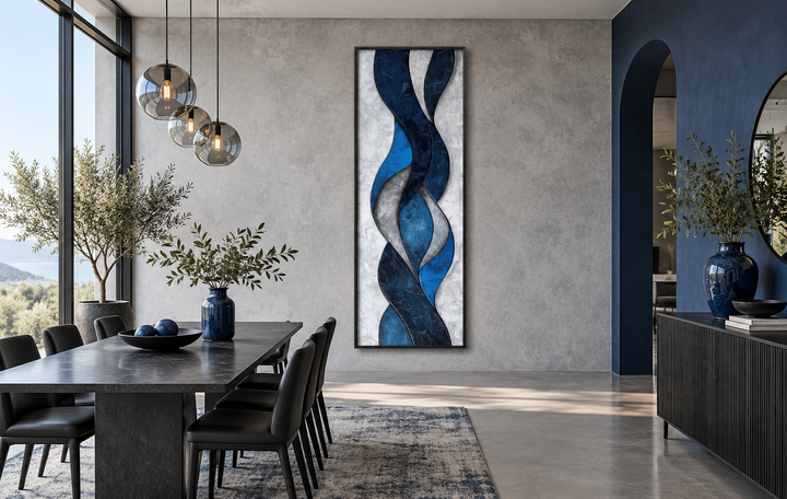 Tall thin vertical navy blue and grey geometric abstract framed canvas wall art in a dining room.