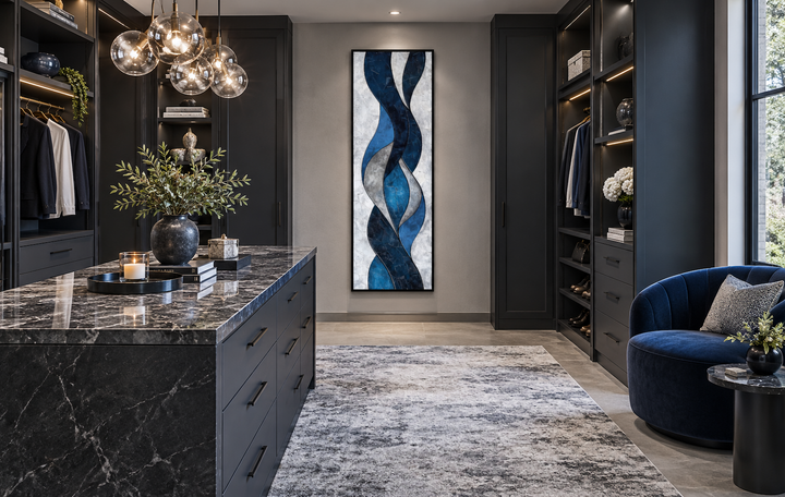 Tall thin vertical navy blue and grey geometric abstract framed canvas wall art in a modern closet.
